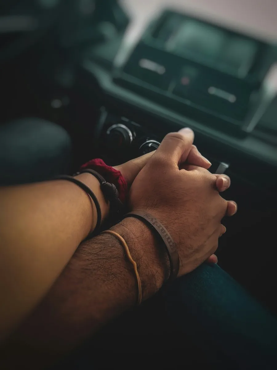 A couple holding hands
